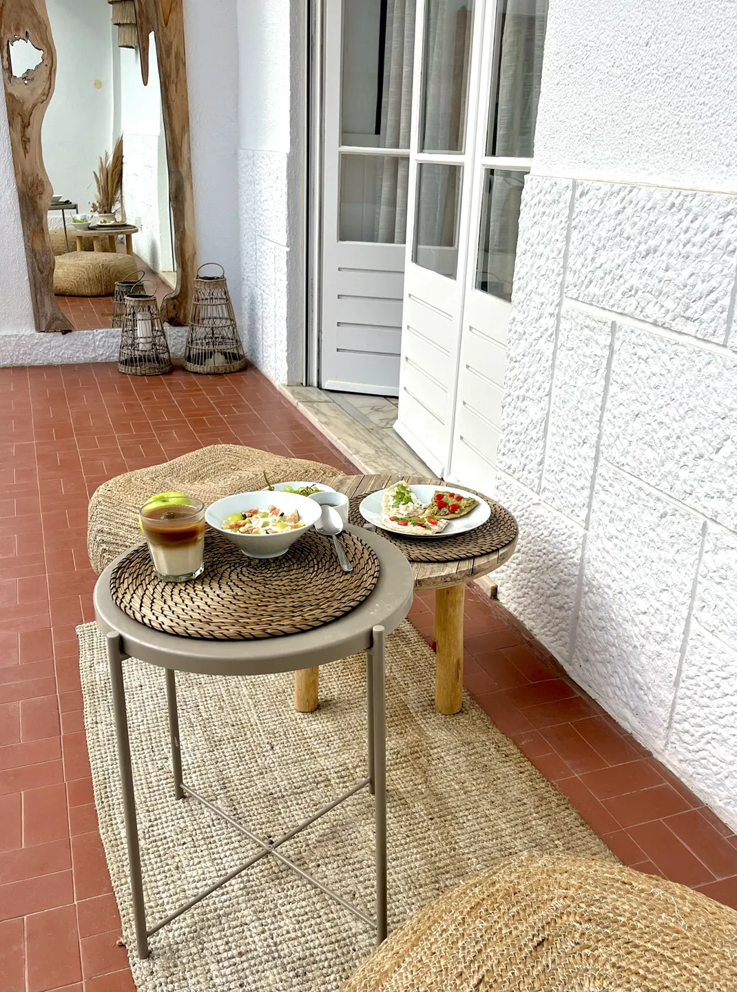 Breakfast served on the porch, by the house's white door