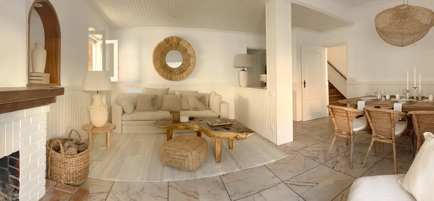 Living room with fireplace and light sofa